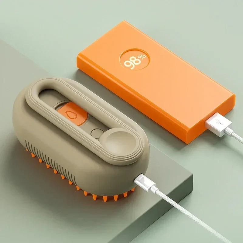 Brosse de toilettage beige reliée par un câble à une batterie externe